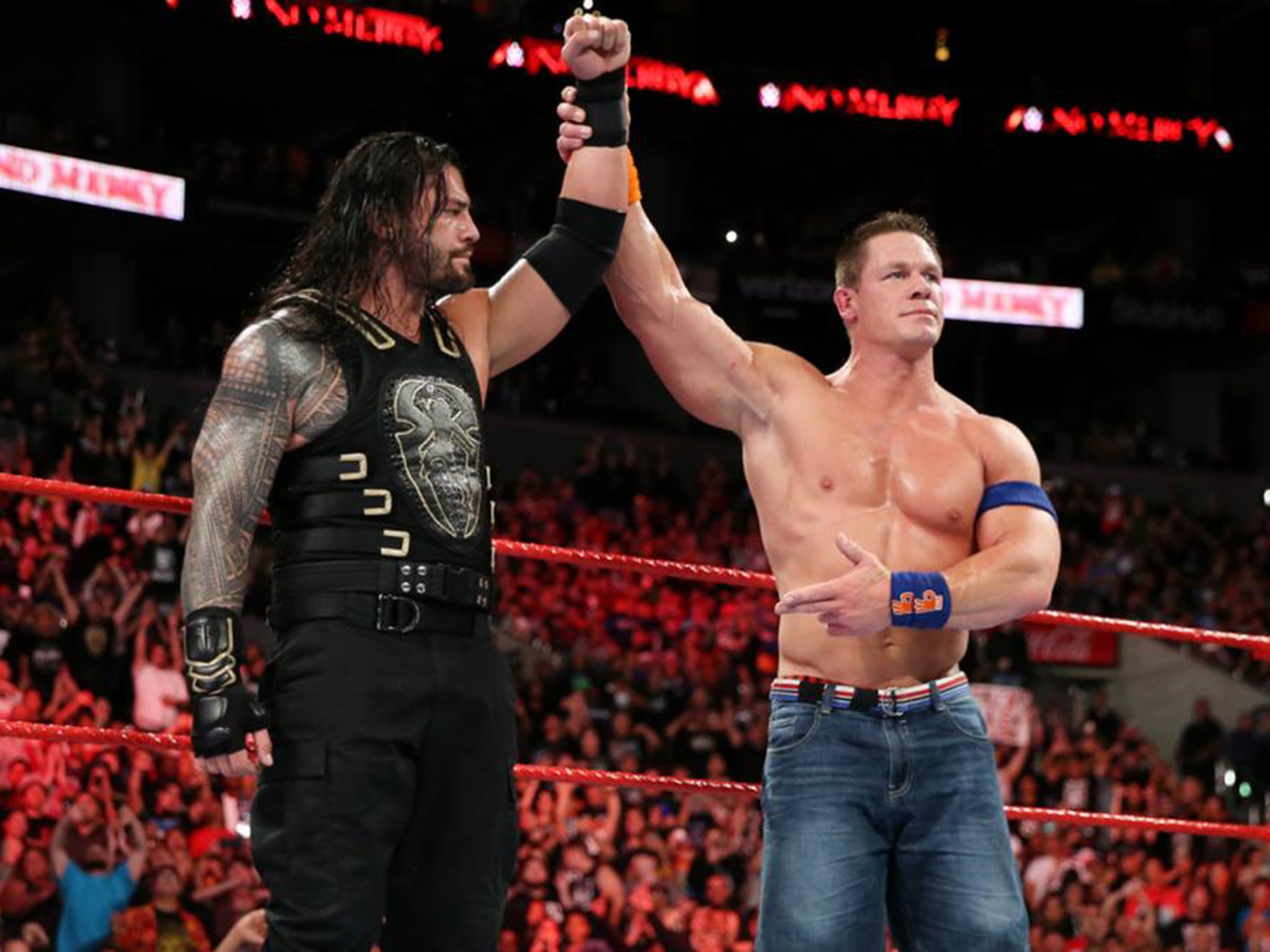 John Cena congratulates Roman Reigns after their No Mercy encounter