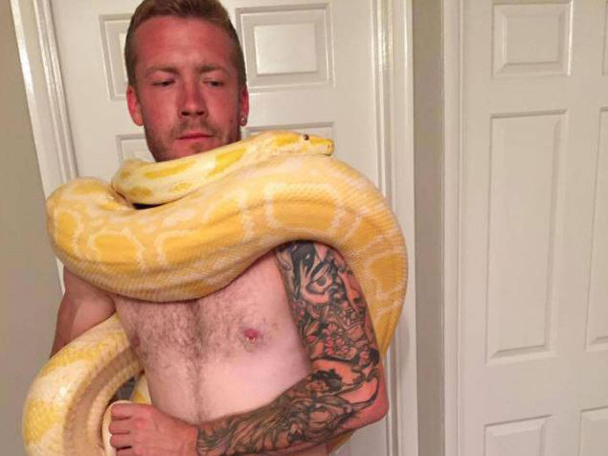 Dan Brandon pictured with a python