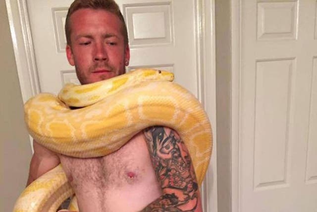 Dan Brandon pictured with a python
