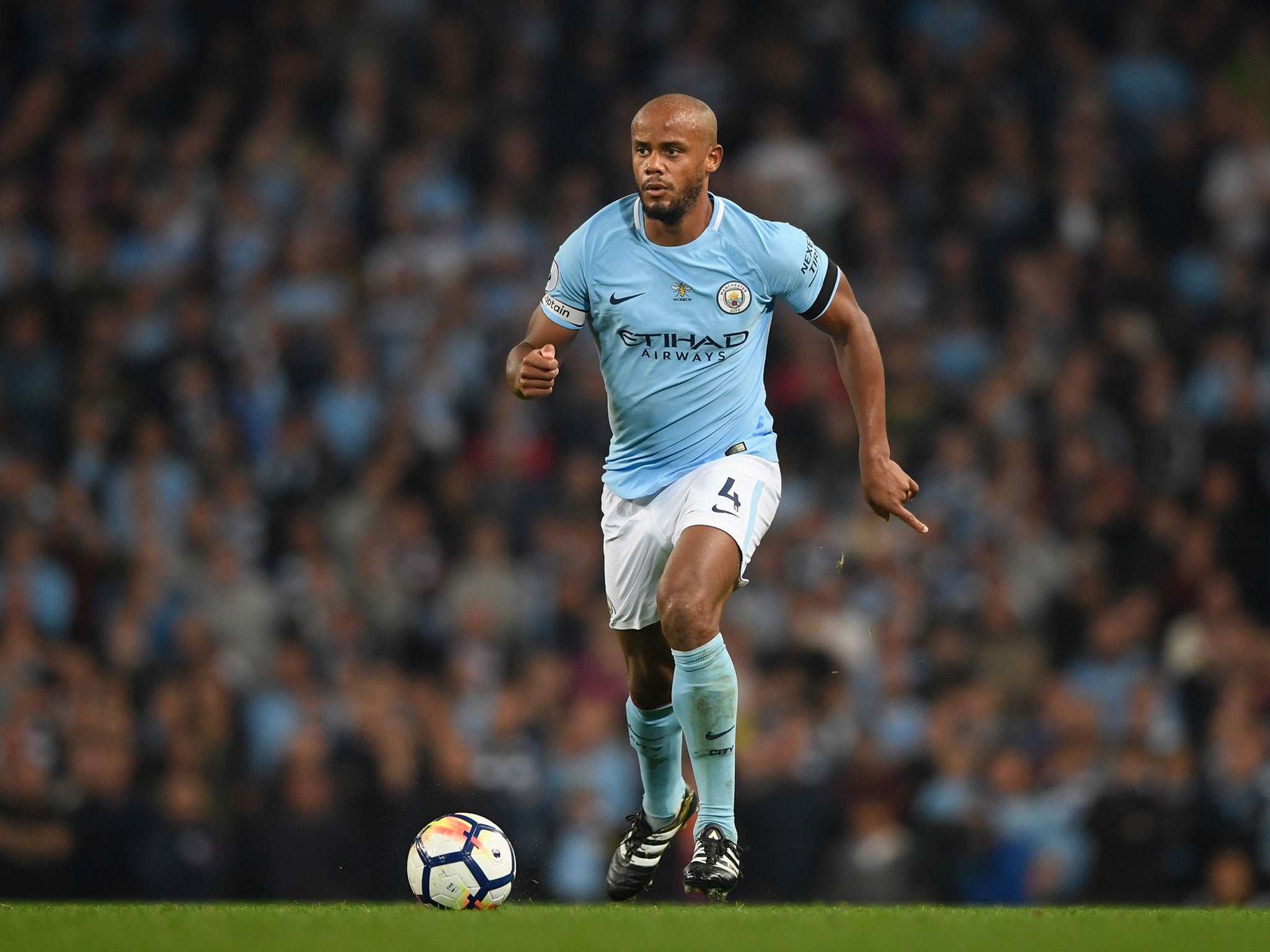 Vincent Kompany in action for City against Everton
