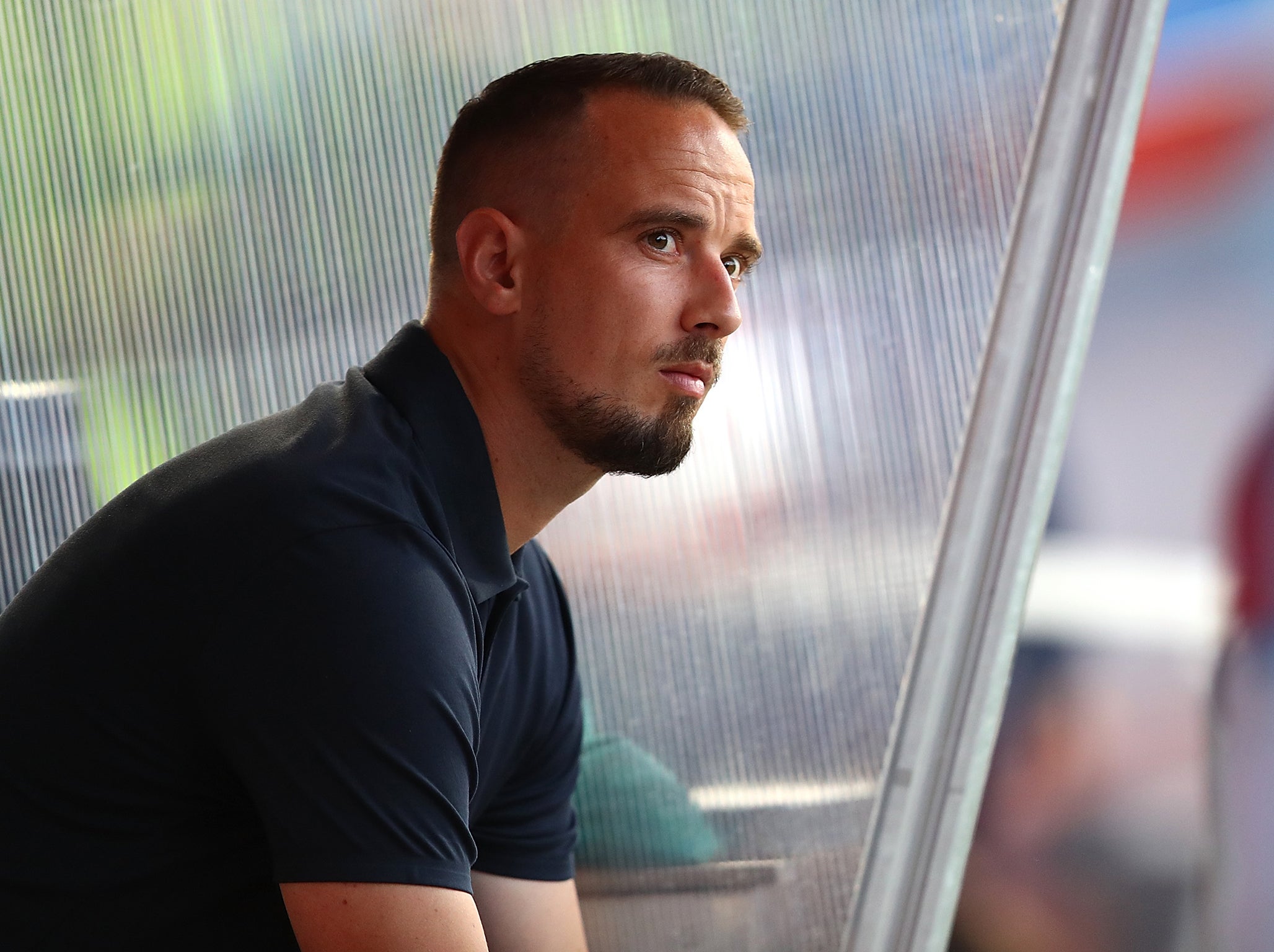 Mark Sampson has been found guilty of using racially discriminatory language to England players