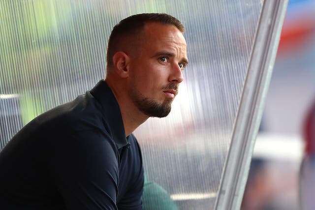 Mark Sampson has been found guilty of using racially discriminatory language to England players