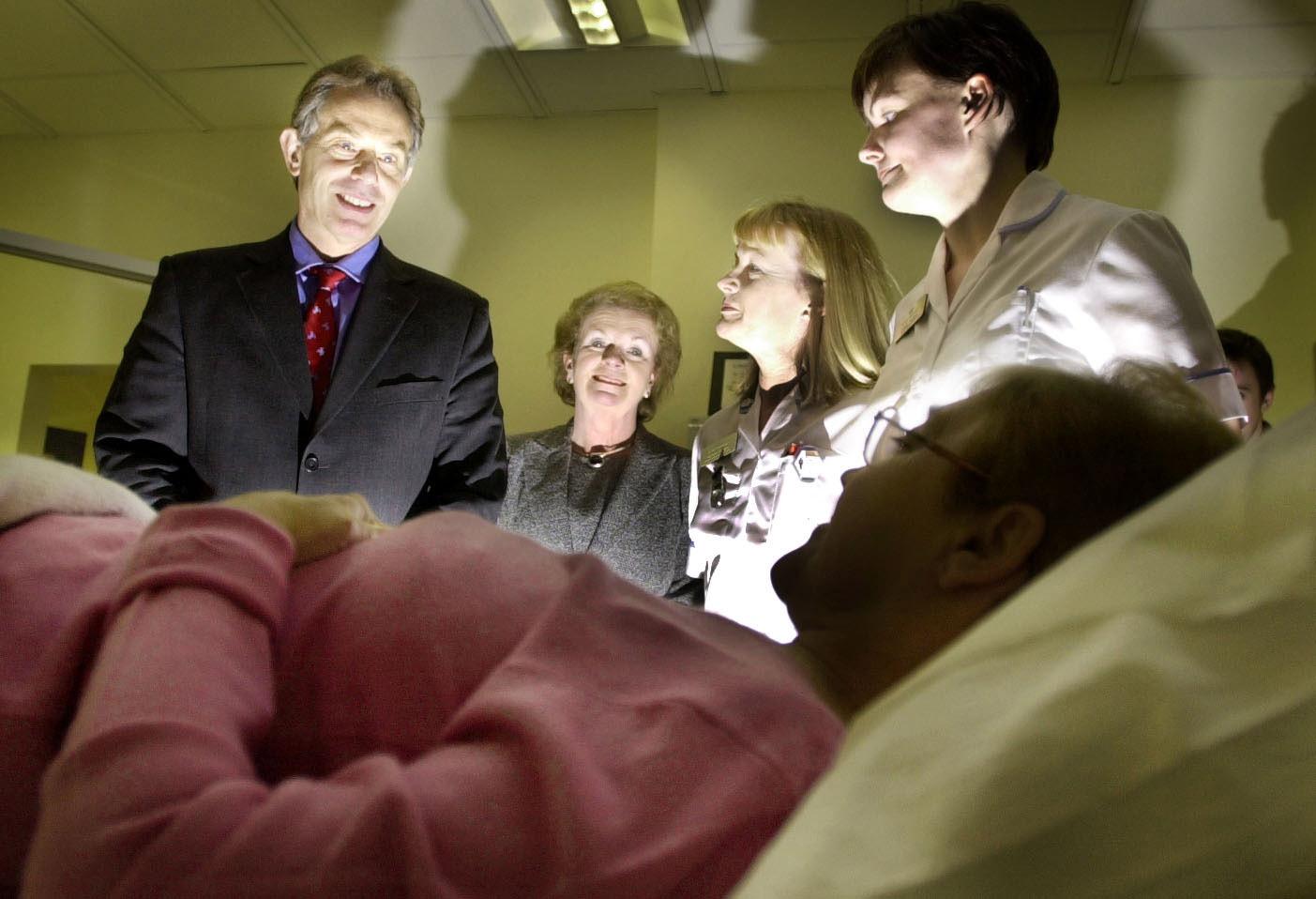Tony Blair and then-Scottish Secretary Helen Liddell during a 2003 visit to Edinburgh`s Royal Infirmary, which was built under a Private Finance Initiative (PFI) deal