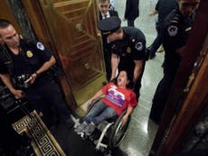 Disabled protesters dragged out of first hearing on Graham-Cassidy 