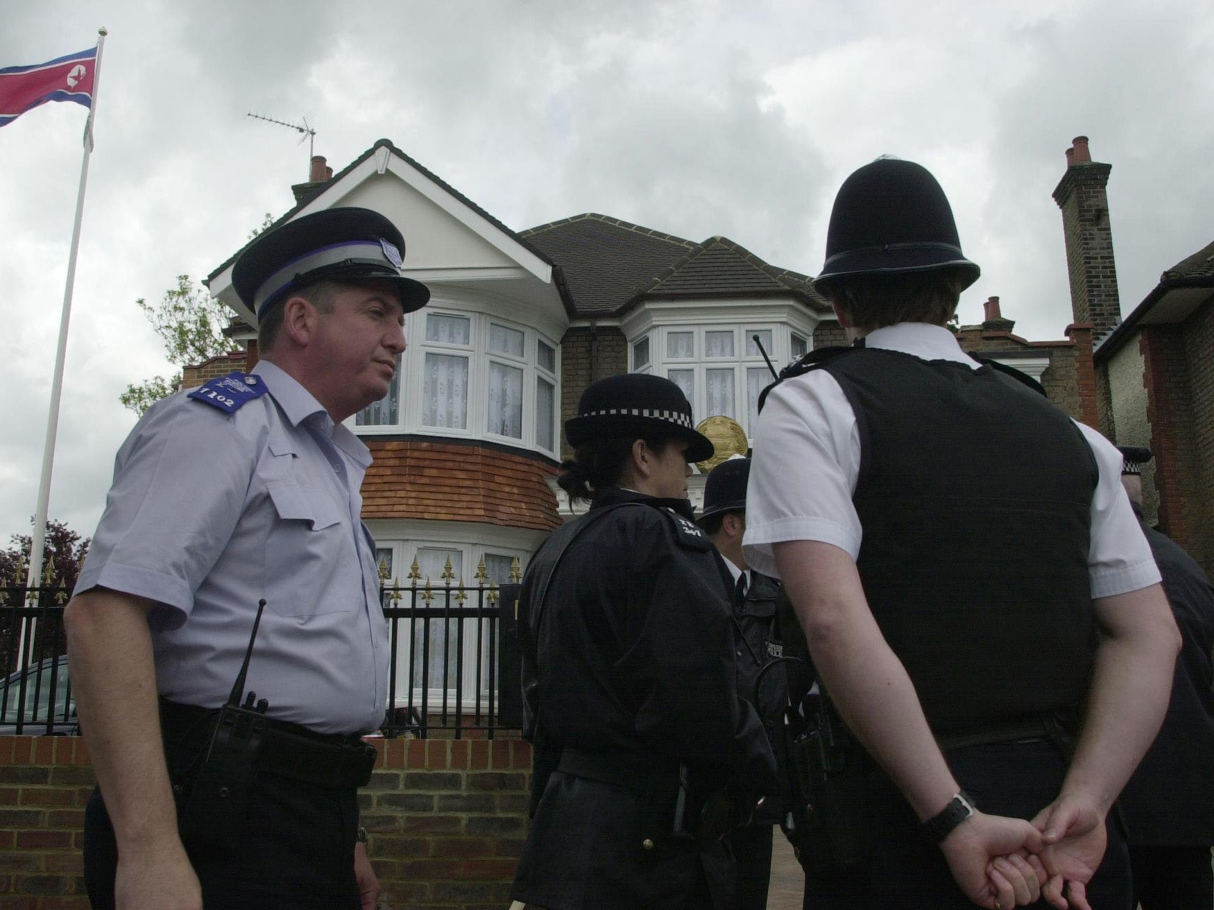 File photo: Police stand outside the North Korean embassy in Ealing on the day it was opened in 2003