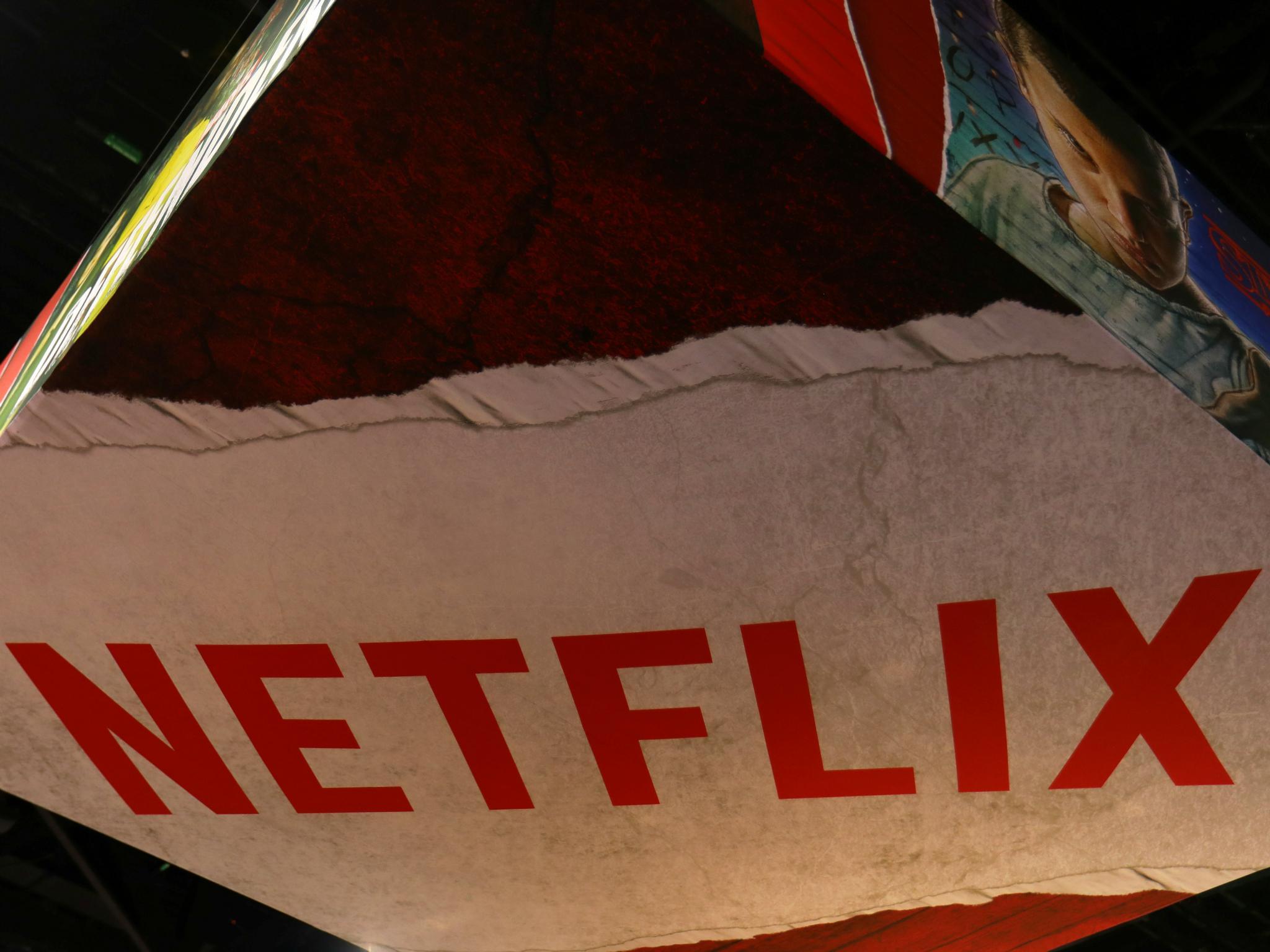 The Netflix logo is shown above their booth at Comic Con International in San Diego, California, U.S., July 21, 2017