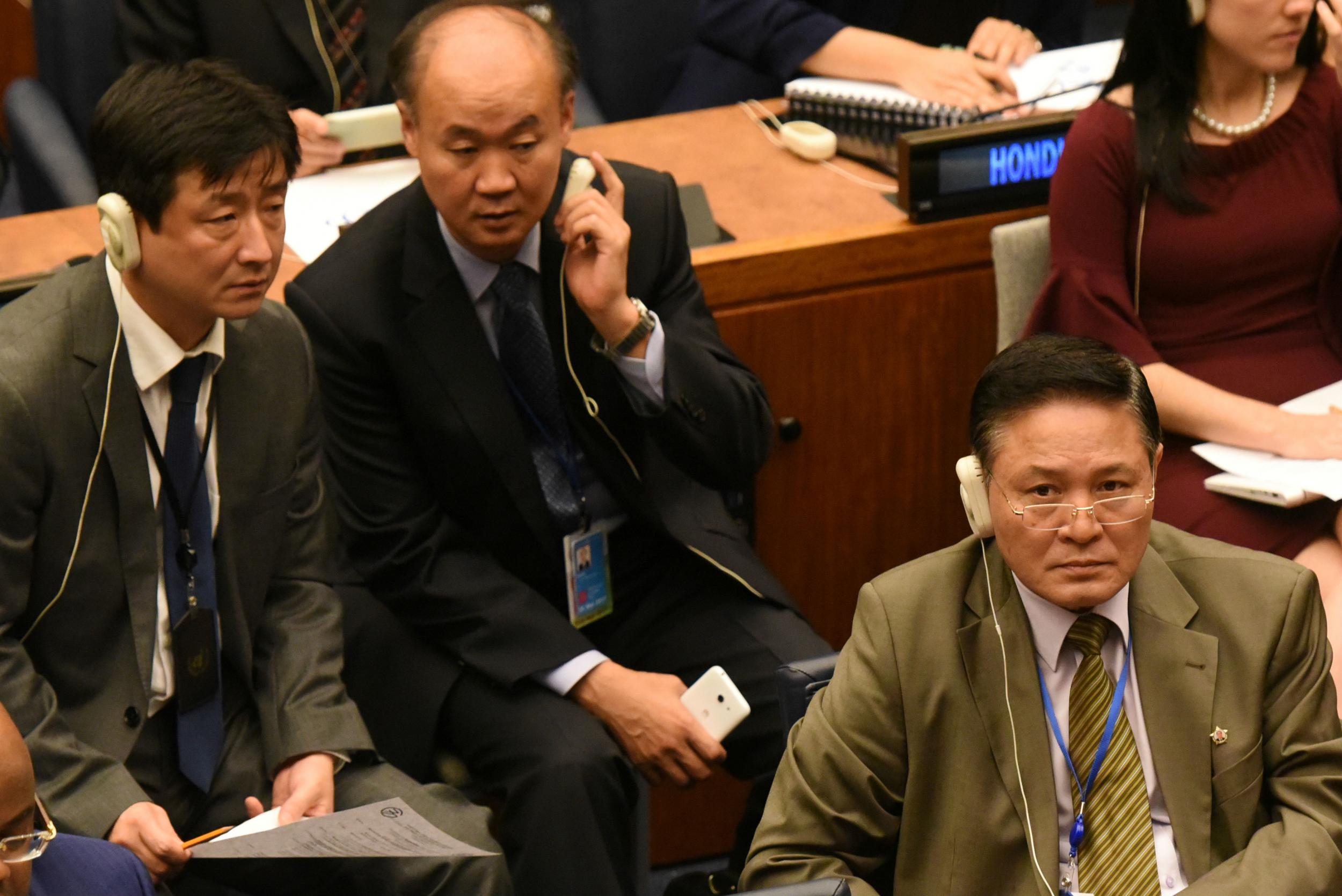 North Korea's Ambassador to the United Nations Ja Song Nam sits with his team during at the United Nations General Assembly in New York City on September 22, 2017.