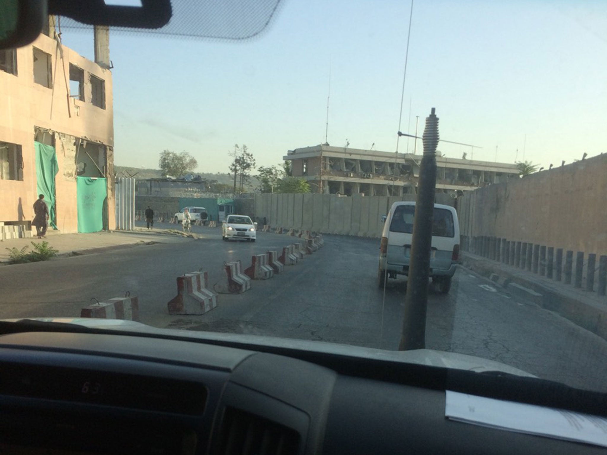 Samim Bigzad being transported in a bulletproof car through Kabul