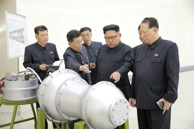 North Korean leader Kim Jong-un inspects a nuclear weapons programme in a photo released by the DPRK's state new agency