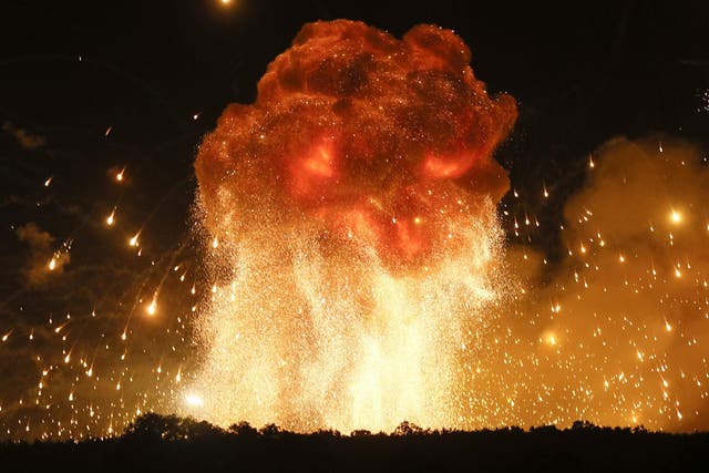 A powerful explosion is seen in the ammunition depot at a military base in Kalynivka, west of Kiev, Ukraine