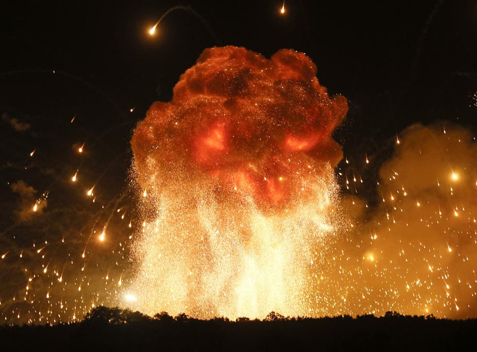 A powerful explosion is seen in the ammunition depot at a military base in Kalynivka, west of Kiev, Ukraine