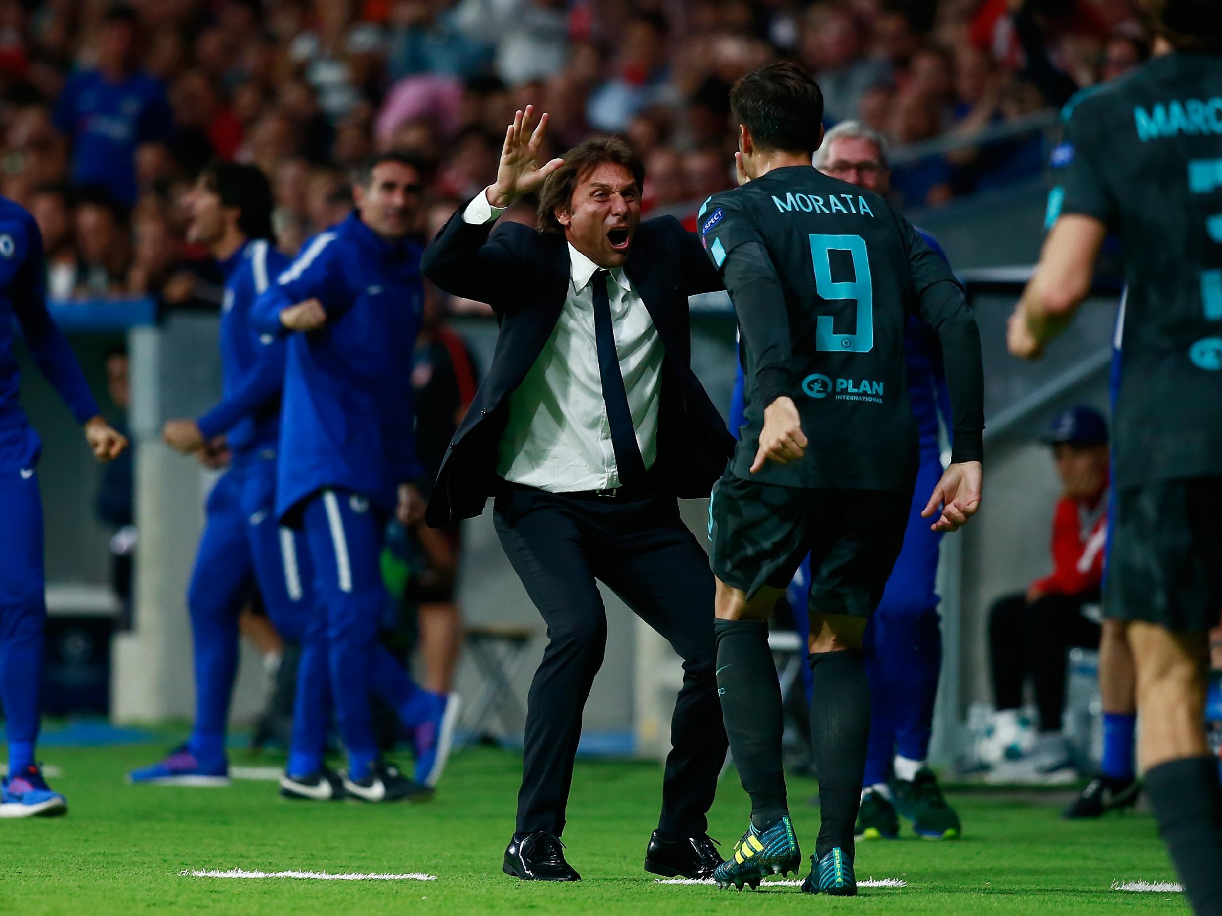 Alvaro Morata celebrates his goal with Chelsea boss Antonio Conte