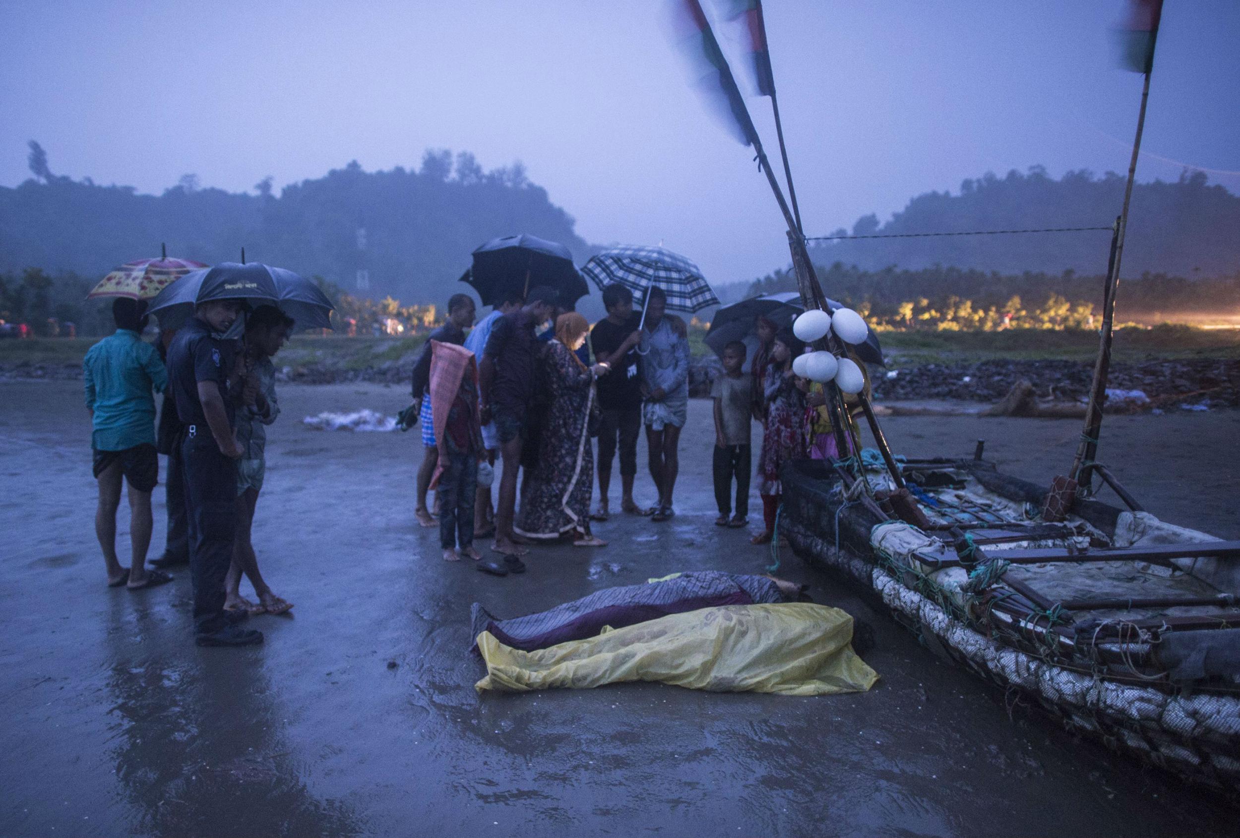 At least 14 people were killed, including ten children, after a boat containing Rohingya refugees capsized