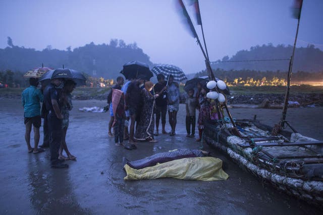 At least 14 people were killed, including ten children, after a boat containing Rohingya refugees capsized