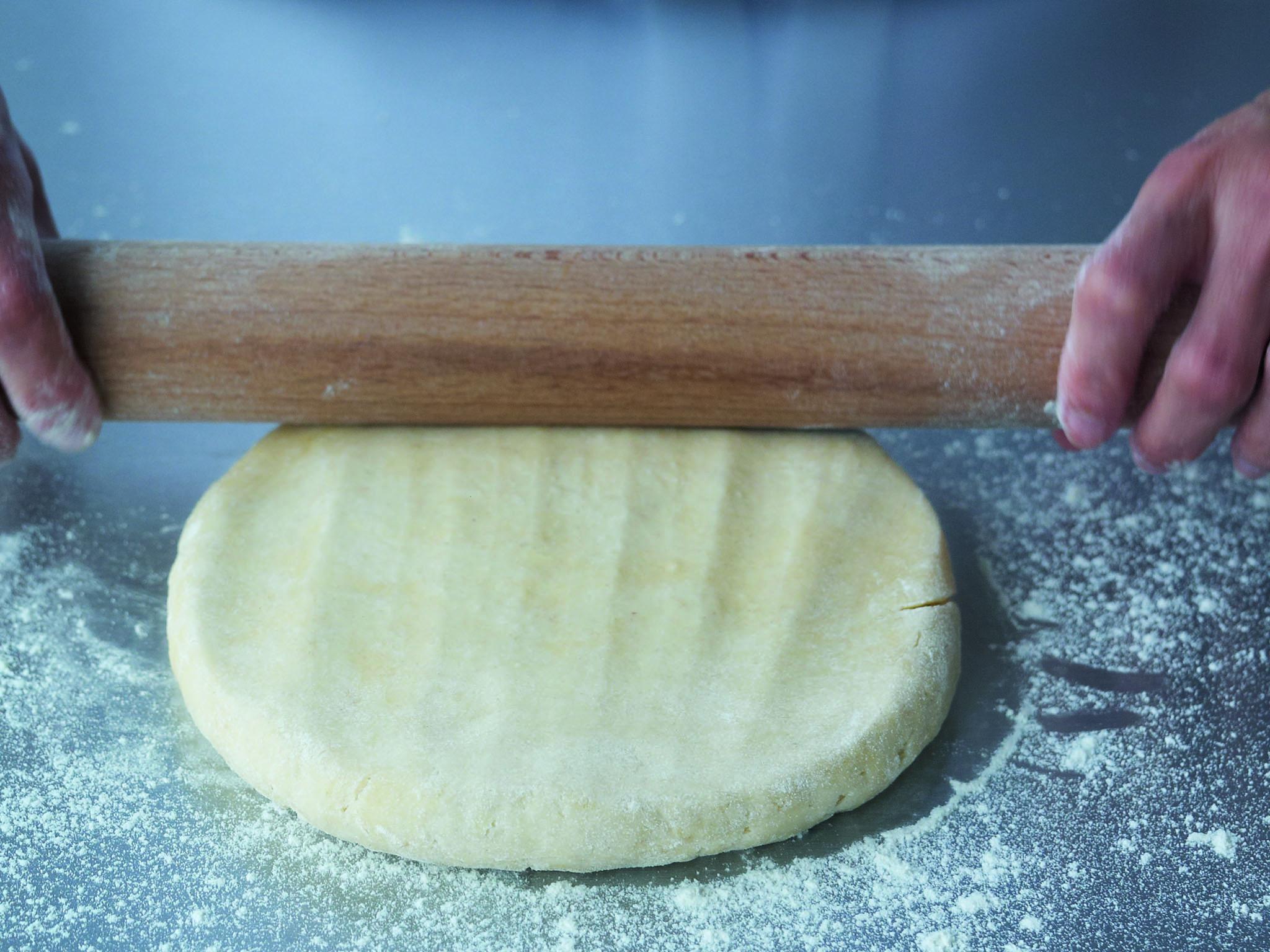 2. Once the circle has at least doubled in size, start to roll it. Use 3 short, sharp strokes of the rolling pin, rather than one long roll. Turn the pastry 90 degrees after every few rolls