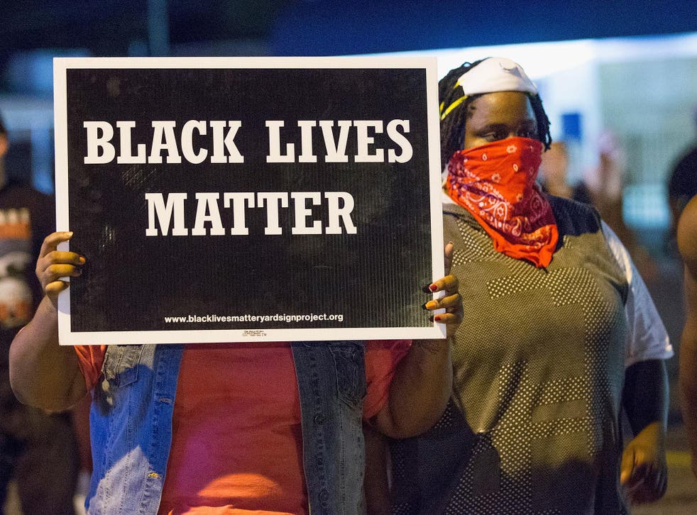 Black Lives Matter protesters in Ferguson in 2015 on the anniversary of Michael Brown's death