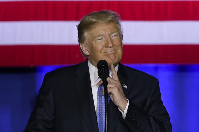 President Donald Trump speaks in Indianapolis. He is calling the current tax system a "relic" and a "colossal barrier" that's standing in the way of the nation's economic comeback.