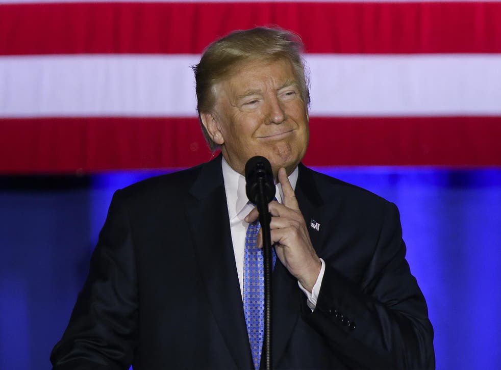 President Donald Trump speaks in Indianapolis. He is calling the current tax system a "relic" and a "colossal barrier" that's standing in the way of the nation's economic comeback.