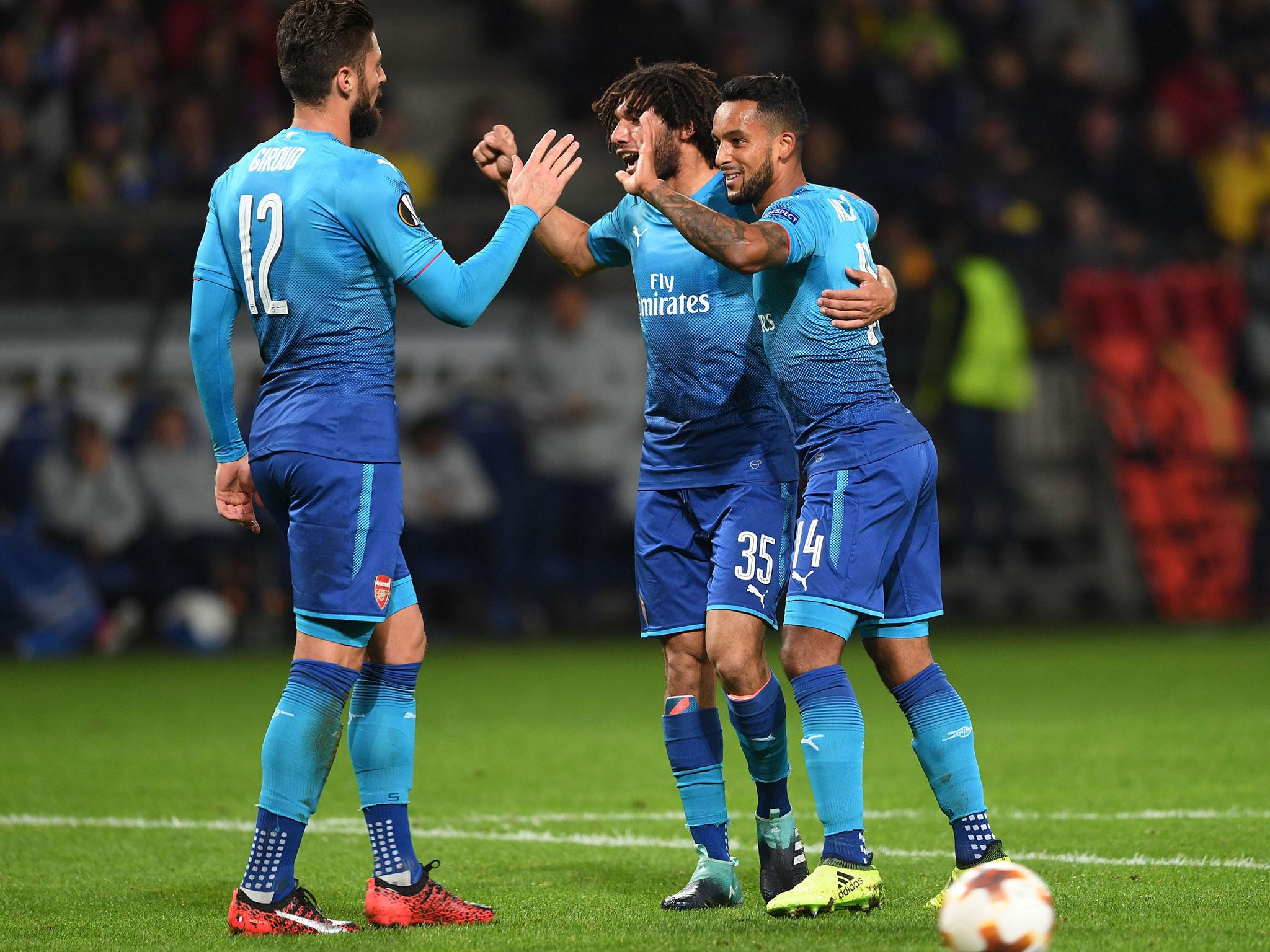 Olivier Giroud celebrates his 100th goal with his teammates