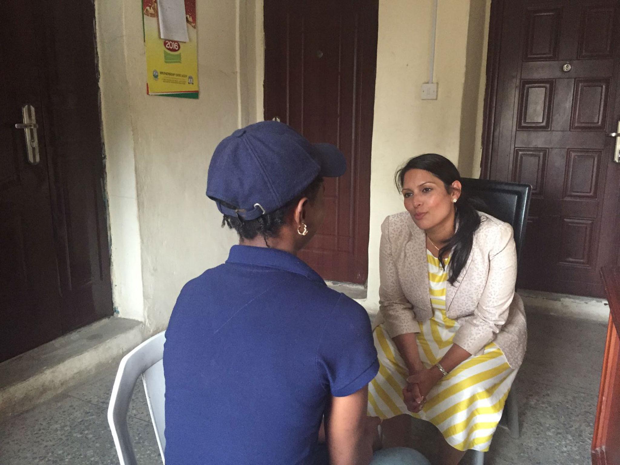 Priti Patel meets a woman in the Lagos safe house. The Department for International Development has pledged £7m to investigate how to combat trafficking between Britain and Nigeria