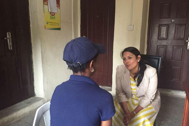 Priti Patel meets a woman in the Lagos safe house. The Department for International Development has pledged £7m to investigate how to combat trafficking between Britain and Nigeria