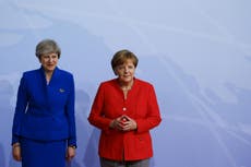 Theresa May meets Angela Merkel to push for Brexit progress