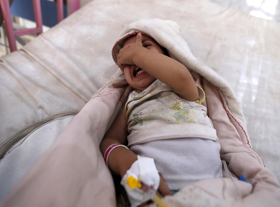 A child suspected of being infected with cholera cries at a hospital in Sanaa, Yemen on 12 August 2017