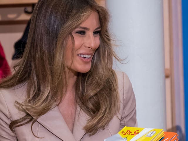 US First Lady Melania Trump offer presents as she visits the Queen Fabiola children's hospital, on the sidelines of the NATO (North Atlantic Treaty Organization) summit
