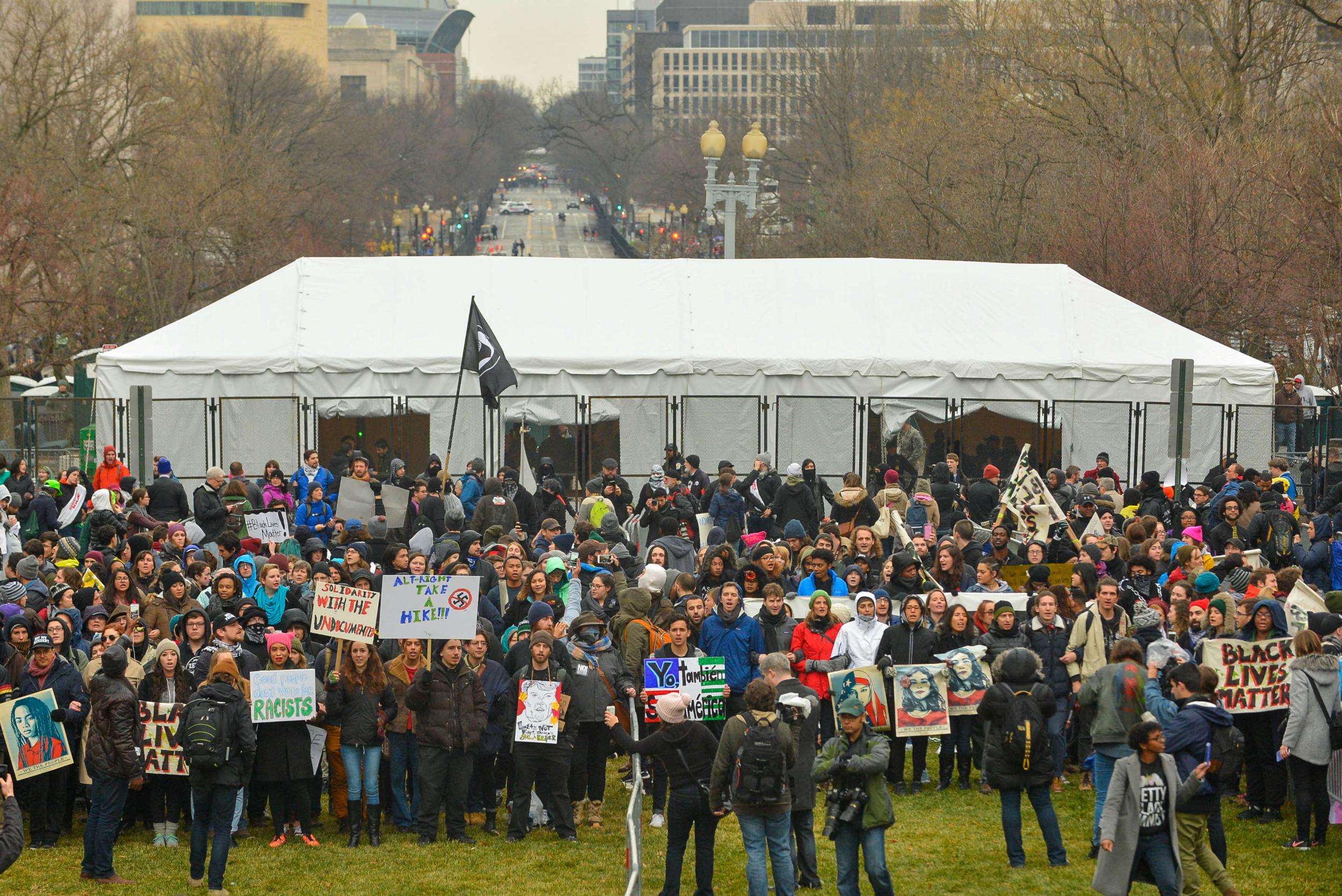 Protesters block an entry point before the inauguration of President-elect Donald Trump in Washington, DC, on January 20, 2017