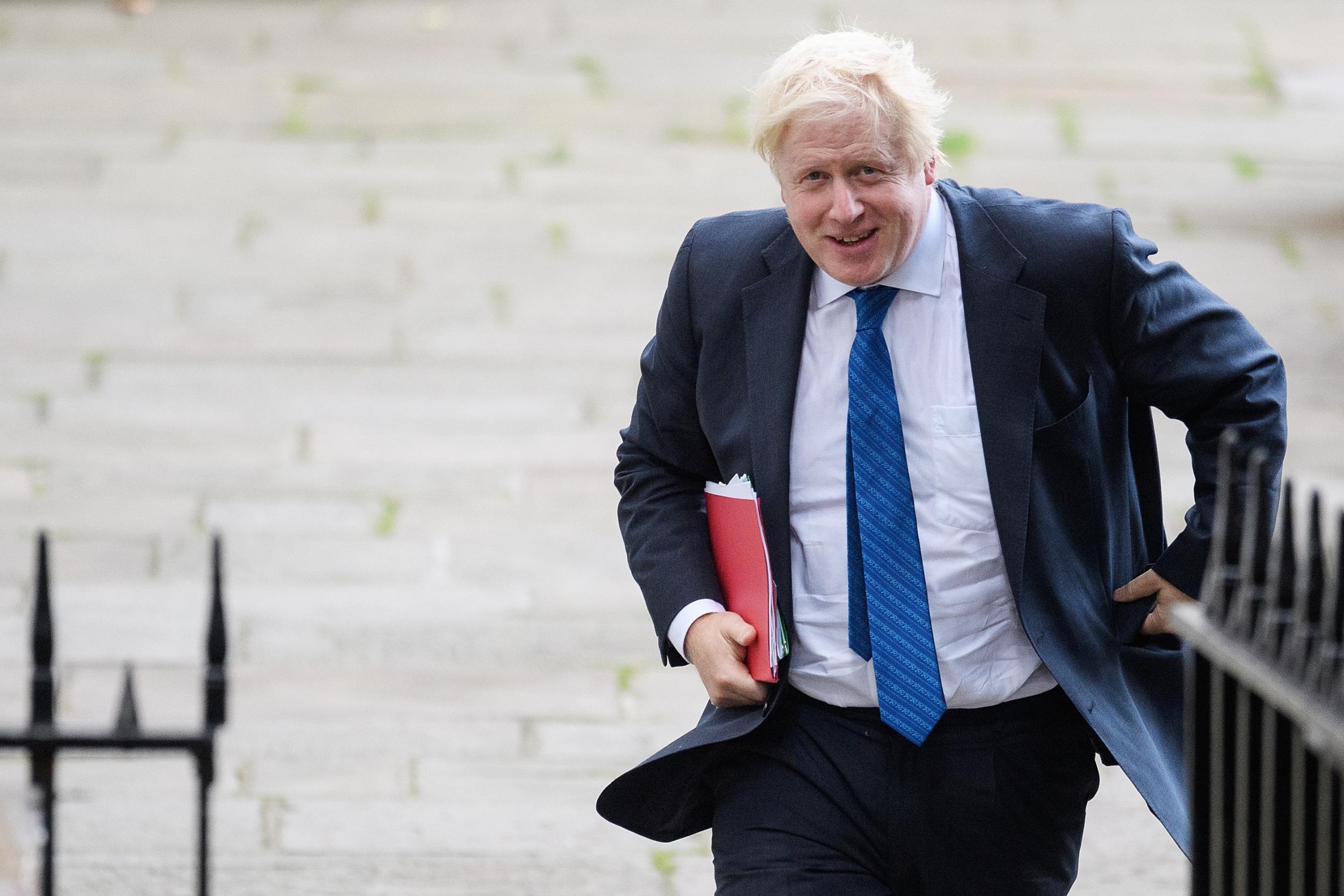 Boris Johnson has called for a faster rising minimum wage ahead of Tory conference
