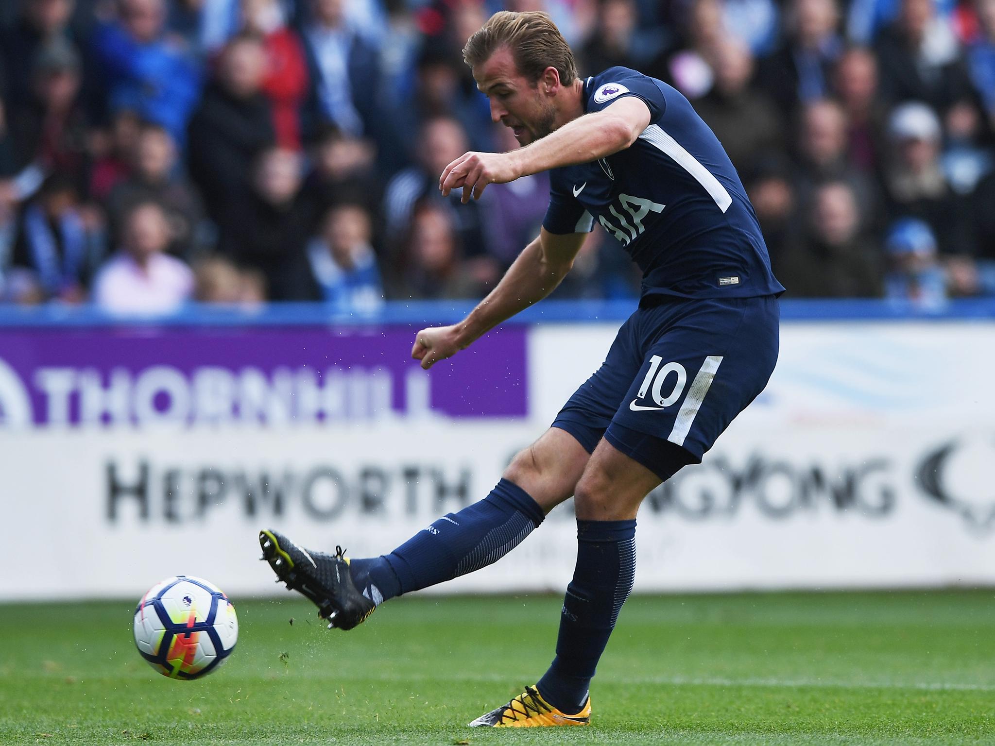 Harry Kane fires Spurs into the lead against Huddersfield Town