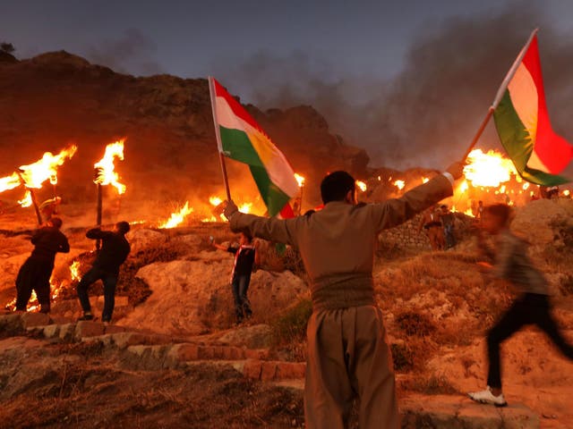 Kurds march before the independence vote in support of regional independence