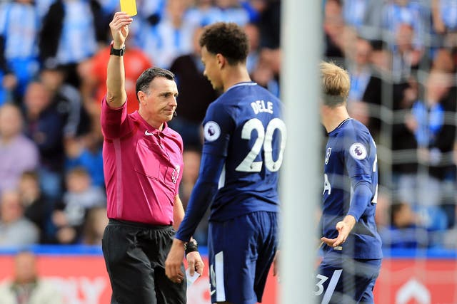 Dele Alli was booked for diving in the second half of Tottenham's 4-0 win over Huddersfield