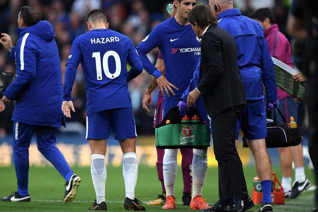 Alvaro Morata is forced off in the first half with what looked to be a hamstring injury
