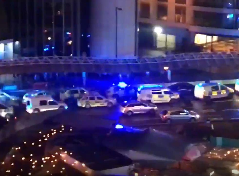 Police and ambulance vehicles parked on Old Street roundabout