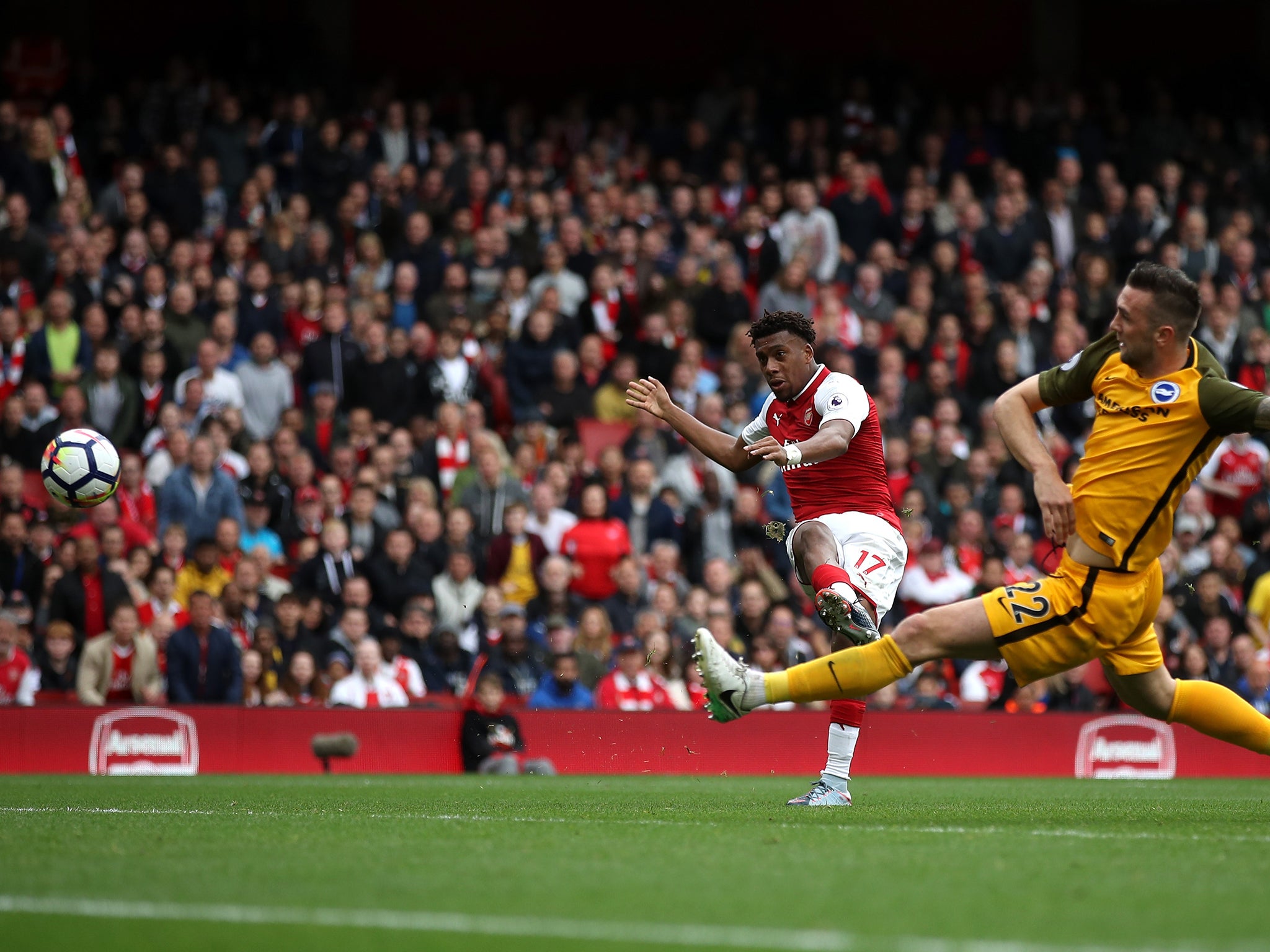 Iwobi fires the ball past Brighton goalkeeper Matthew Ryan to double the lead