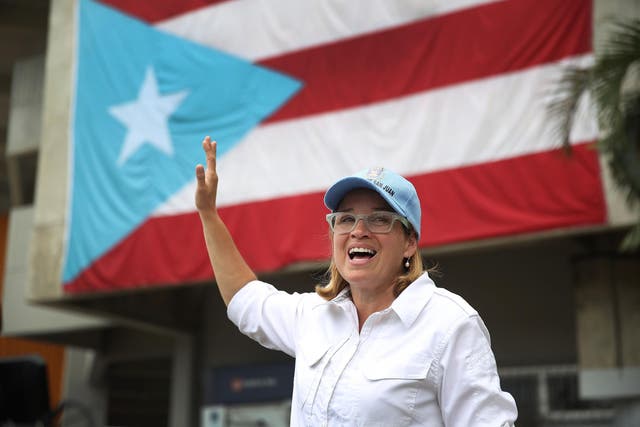 San Juan Mayor Carmen Yulin Cruz speaks to the media as she arrives at the temporary government center setup at the Roberto Clemente stadium in the aftermath of Hurricane Maria on September 30, 2017