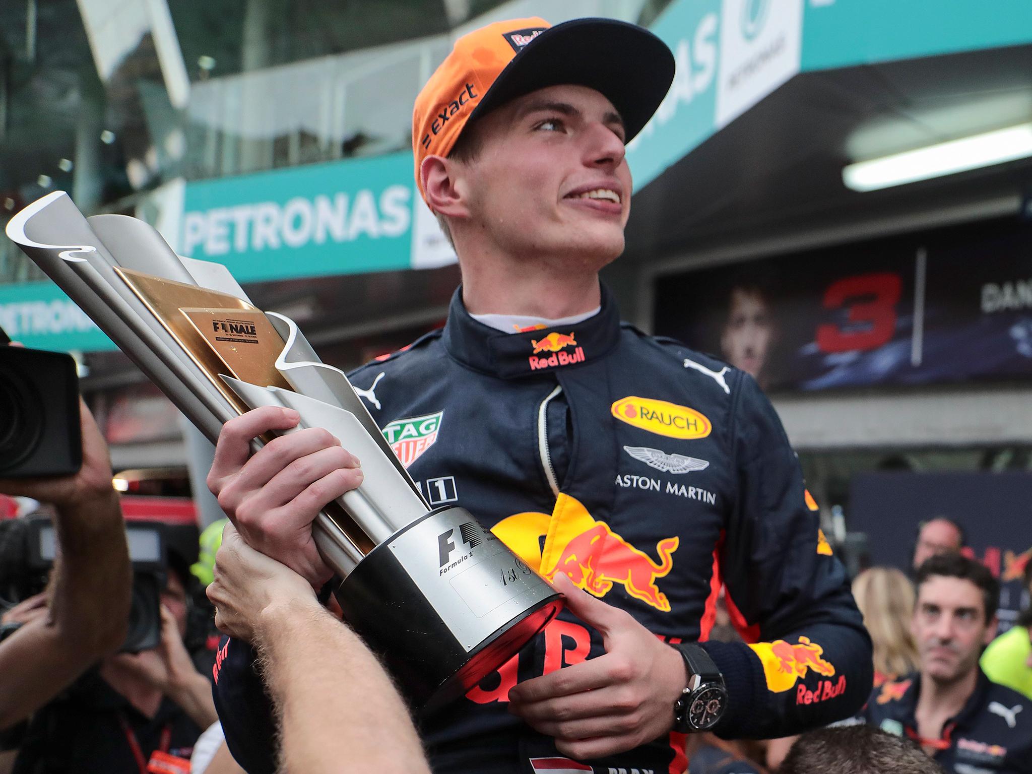 Max Verstappen celebrates winning the Malaysian Grand Prix a day after turning 20