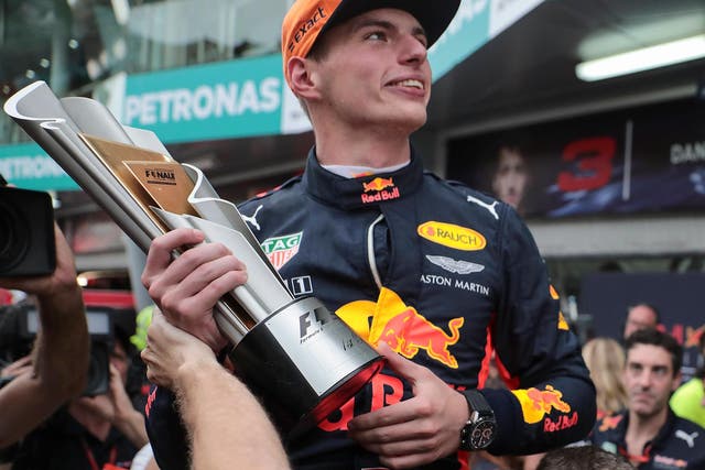 Max Verstappen celebrates winning the Malaysian Grand Prix a day after turning 20