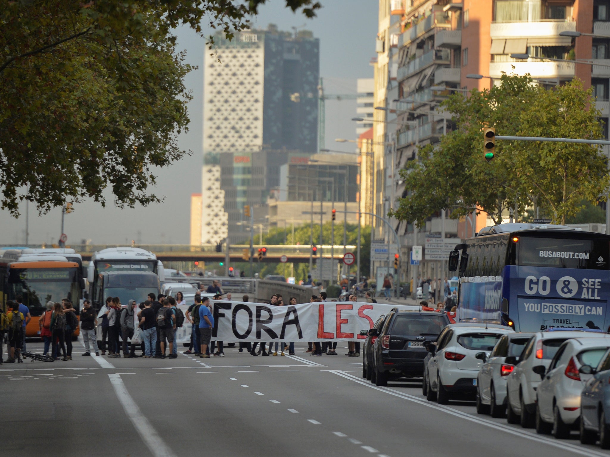 Picketers block Gran Via street during a general strike called by pro-independence parties and unions in Barcelona