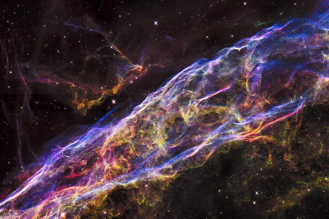 A small section of the expanding remains of the Veil Nebula, a massive star that exploded about 8,000 years ago, is seen in an image from NASA's Hubble Space Telescope released September 24, 2015