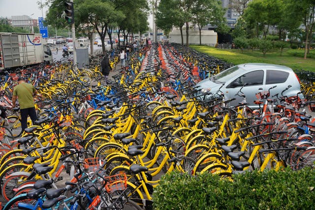 Beijing's parking lots are full of Mobike and Ofo bikes