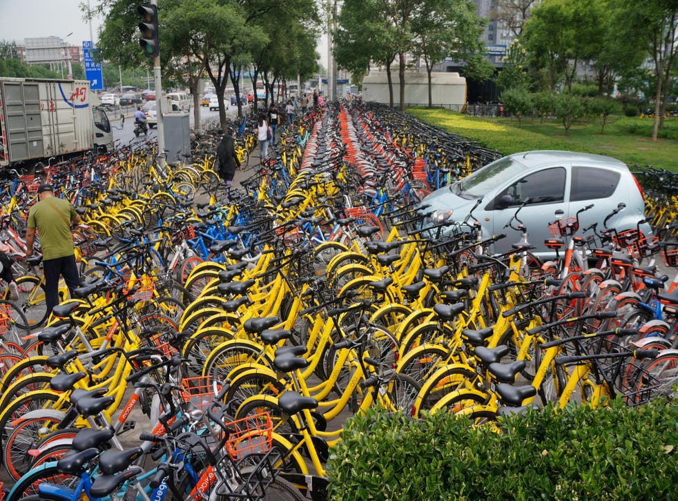 Beijing's parking lots are full of Mobike and Ofo bikes