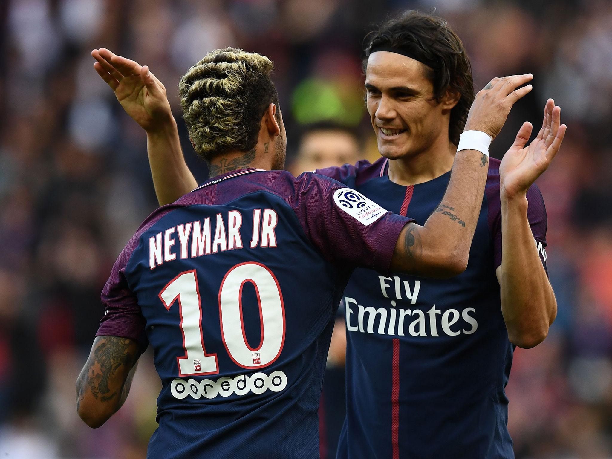 Neymar and Edinson Cavani celebrate a goal together