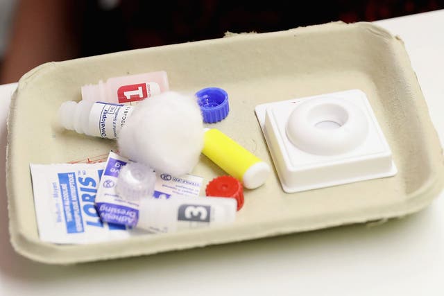 An HIV test kit at a sexual health centre in London, where regular testing has helped reduce the number of new infections by almost a third in just a year