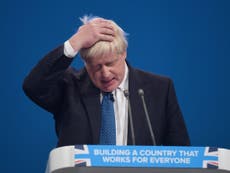 Johnson fails to challenge May in conference speech after Brexit rift