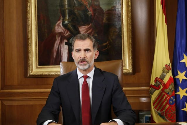 Spain's King Felipe accused Catalan separatist politicians of breaking the law