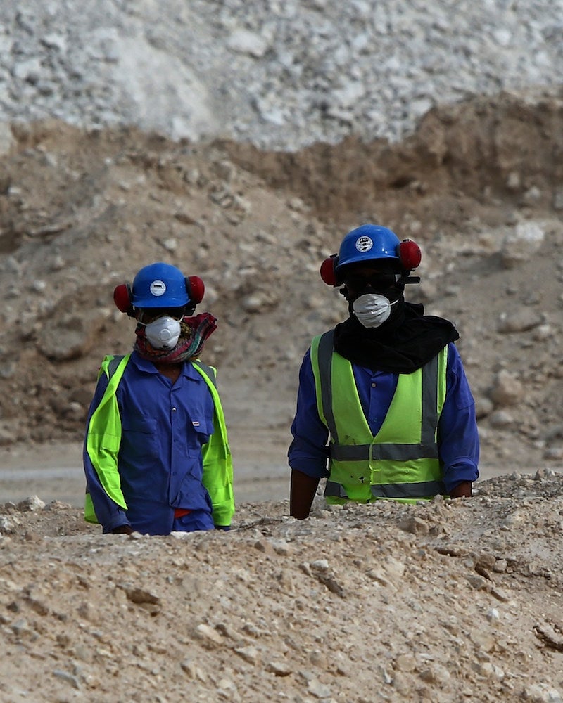 The helpless workers of Qatar look on