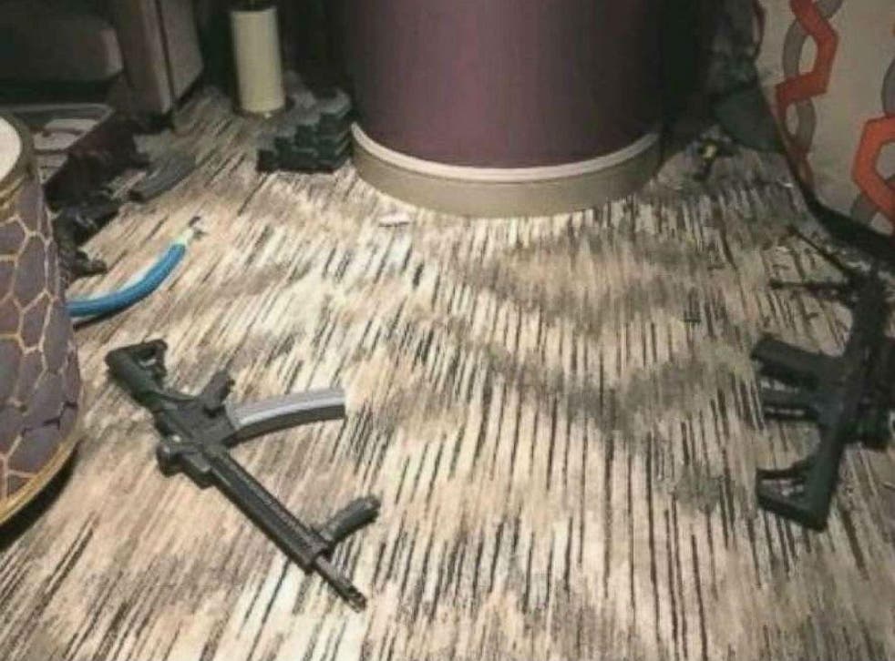 Images from inside Stephen Paddock's hotel room show a number of assault rifles
