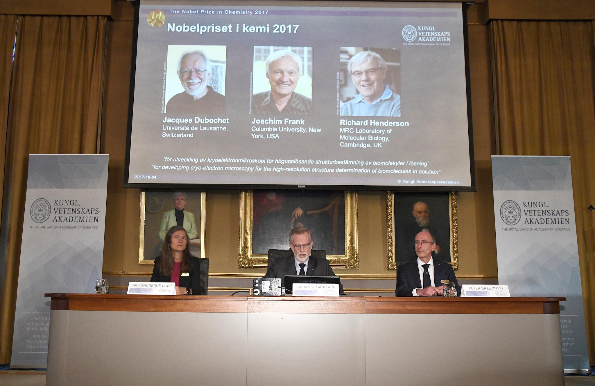 Gunnar von Heijne (C), Secretary of the Nobel Committee for Chemistry 2017, Sara Snogerup Linse, Chair of the Nobel Committee for Chemistry 2017 and Peter Brzezinski, Professor of Biochemistry, announce the winners of the 2017 Nobel Prize in Chemistry during a press conference in Stockholm, Sweden, October 4, 2017